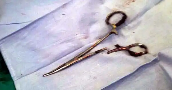 Scissors Pulled From A Man